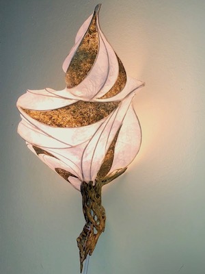 Light sculpture "Desert Flame" with paper over reed, okra handmade paper accents, and cholla wood base