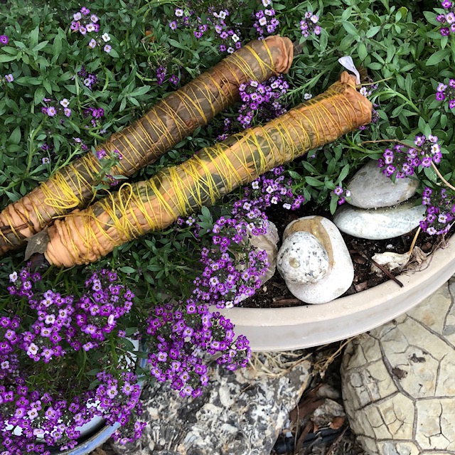 silk fabric bundles rolled on a stick after steaming