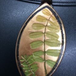 pendant with vetch leaf on polymer clay
